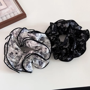 Elegant ink wash scrunchie set in black and white chiffon with stylish piped edges
