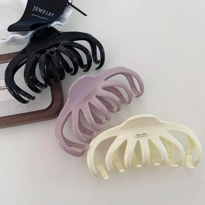 French style large hair claws in black, pink and beige with polished finish for thick hair