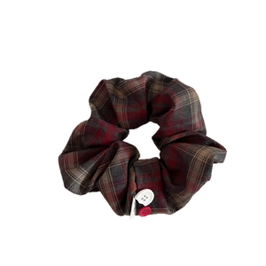 Vintage red and blue plaid scrunchie with button accents for elegant ponytails