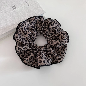 Vintage leopard print oversized scrunchie hair tie made of smooth soft fabric