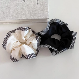 Minimalist satin hair scrunchies set with checkered edges in black and white colors