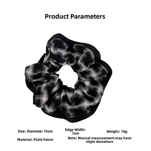 Detailed dimensions of the black and white plaid scrunchie with 15cm total diameter