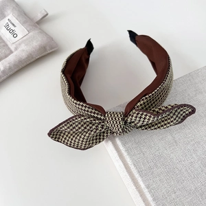 Retro houndstooth bow headband with wide brim and vintage fabric texture for women