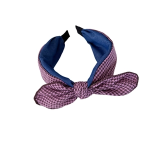 Retro purple houndstooth headband with bowknot design for women on white background