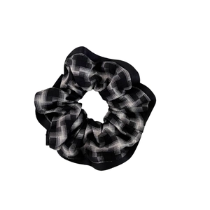Classic black and white plaid scrunchie with soft fabric and durable elastic hair tie