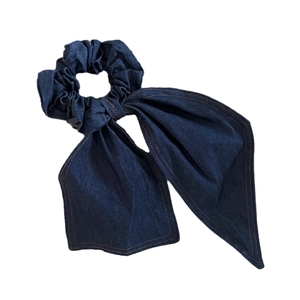 Deep blue denim oversized bow hair tie with long ribbons and premium brown stitching details