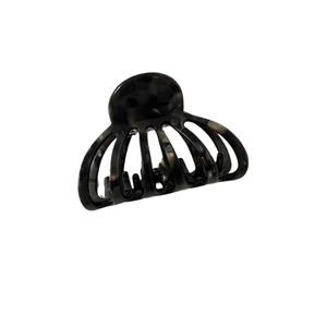 Classic shell-shaped hair claw clip with tortoise marble pattern for hair styling
