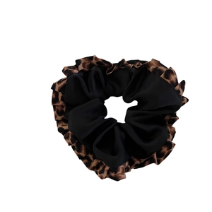 Leopard print and black satin patchwork scrunchie with ruffled pleated fabric texture