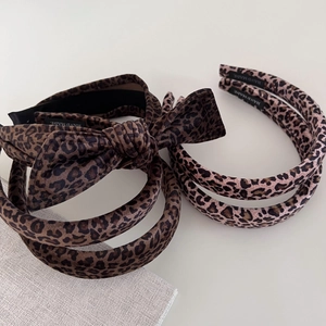 Retro leopard print velvet sponge headbands set featuring a large bow and classic patterns