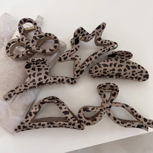 Brown leopard print hair claw clip set in various geometric resin shapes for women