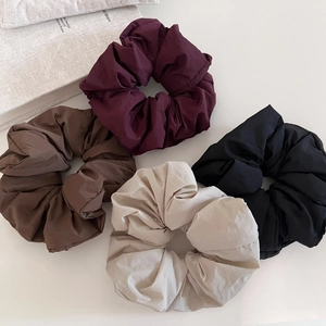 Set of four oversized matte puffy scrunchies in burgundy, coffee, beige, and black