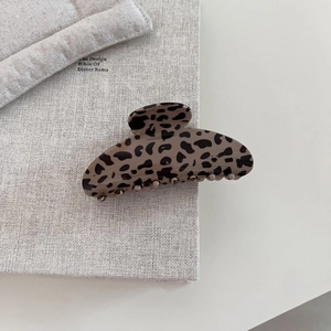 Vintage leopard print hair claw clip in coffee resin finish for elegant updo styles