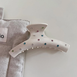 Polka dot acetate hair claw with colorful rhinestones in elegant cream white finish