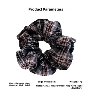 Detailed dimensions of the vintage plaid knit scrunchie featuring its 12cm diameter