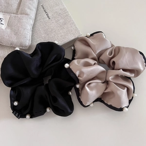Elegant satin scrunchies with white pearls in black and champagne gold colors