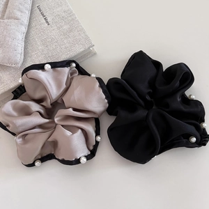 Elegant satin scrunchies with white pearl edges in champagne and black colors