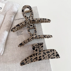 Three-piece set of stylish leopard print hair claws with matte finish for hair styling