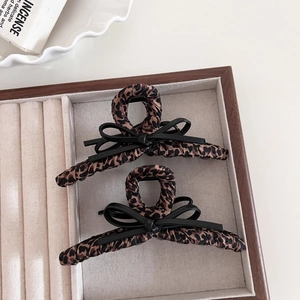 Retro leopard print hair claw clips with black leather bows for thick hair styling