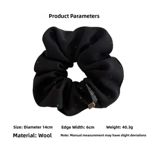 Polka dot wool scrunchie with 14cm diameter and 6cm width size specifications