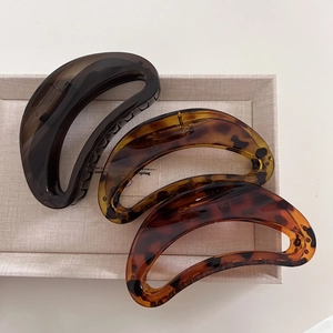 Three-piece set of large French vintage tortoiseshell hair claws in crescent moon shape
