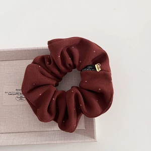 Vintage burgundy polka dot oversized scrunchie with Lucky For Love tag and gold charm