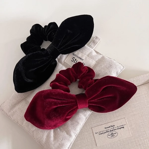 Elegant vintage velvet bow hair scrunchies in classic black and wine red colors