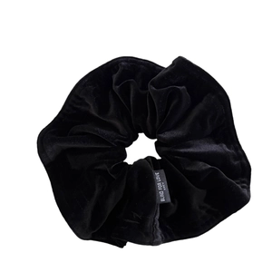 Large black velvet hair scrunchie with blind for love label for elegant hairstyles