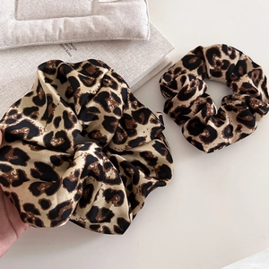 Vintage leopard print scrunchie set in satin fabric for stylish high ponytail looks