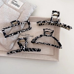 Elegant zebra pattern hair claw clips with gold metal spring for versatile hairstyles