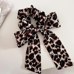 Vintage leopard print scrunchie with long ribbon bow made of high-quality silky fabric