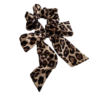 Elegant leopard print silk scrunchie with long ribbons and bow for women hair styling