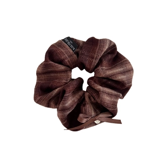 Brown plaid scrunchie with a ribbon bow and heart pendant for autumn winter hairstyles