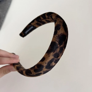 Classic leopard print velvet headband with thick sponge padding and handmade woven label
