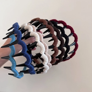 Knitted wave headband with teeth for non-slip grip in multiple winter colors