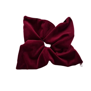 Elegant burgundy velvet scrunchie with pearl accent for women's hair styling