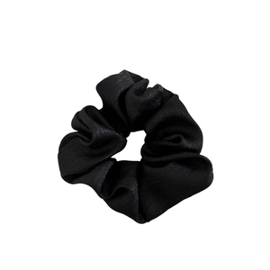 Elegant large black satin scrunchie with a shimmering pearlescent silk finish