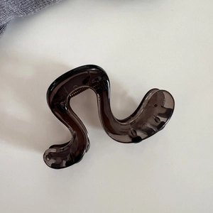 Pince à cheveux minimaliste grise translucide en forme de vague moderne