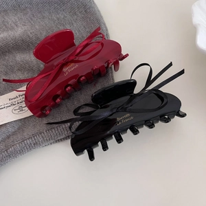 Elegant red and black ballet style hair claw clips with ribbons and gold lettering accents
