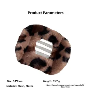 Detail showing plush leopard print hair claw clip size dimensions 10x8cm and weight
