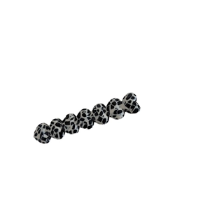 Chic heart-shaped hair clip with vintage black and white cow print pattern design
