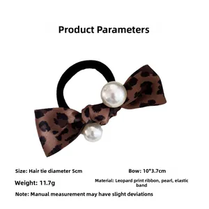 Detailed parameter view of leopard print bow hair tie with pearls and elastic band