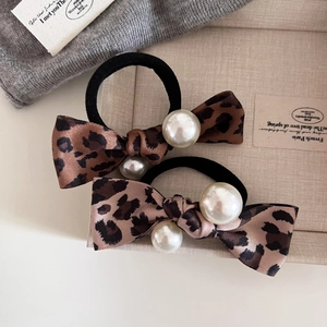 Vintage leopard bow hair tie set with pearl accents on high elastic black bands