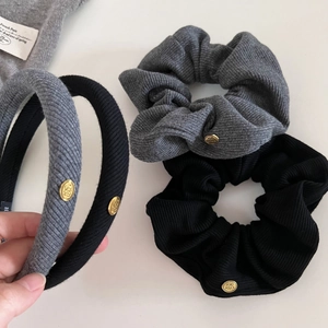 Minimalist knit headband and scrunchie set with gold metal tags in grey and black colors