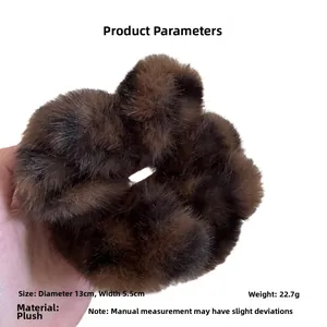 Detail view of plush leopard print scrunchie showing 13cm diameter and 5.5cm width