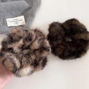 Plush leopard print and dark brown faux fur scrunchie set for stylish autumn hair styling