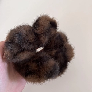 Plush brown leopard print hair scrunchie with fluffy faux fur texture for women