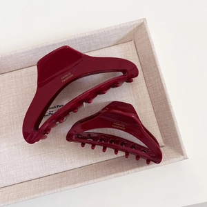 Elegant wine red acetate claw clip set with golden handmade lettering and glossy finish
