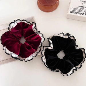 Vintage velvet hair scrunchies with white lace trim in deep red and black colors