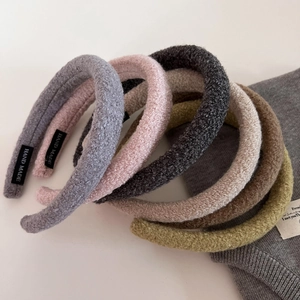 Plush lamb wool padded headbands for women in multiple soft colors with handmade label