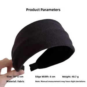 Detailed view of wide black knit headband dimensions 16x13cm and 6cm width parameters